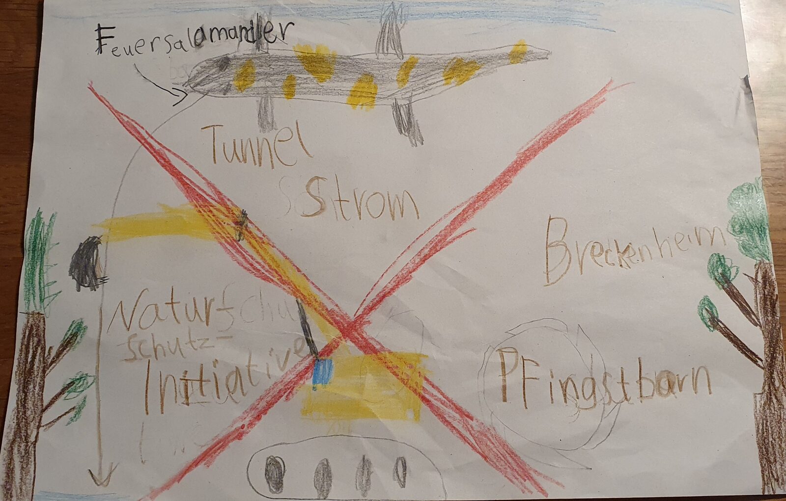 Kinderzeichnung mit Feuersalamander, Pfingstborn und durchgestrichenem Bagger
